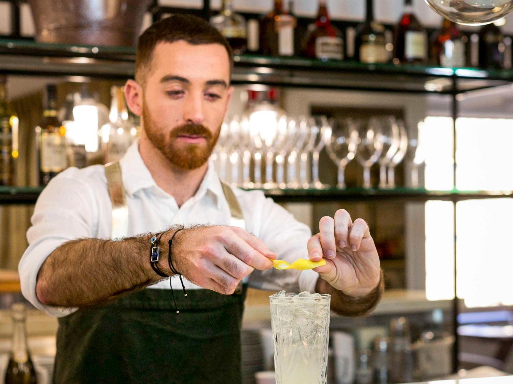 The Sebel Quay West Suites Sydney Exteriör bild A bartender at work